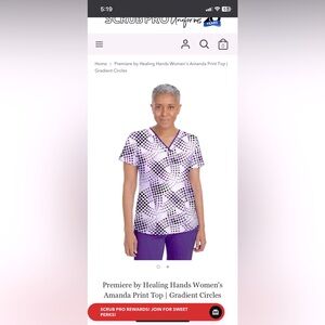 Healing Hands women’s Scrub top size XS purple white and black polka dot style.